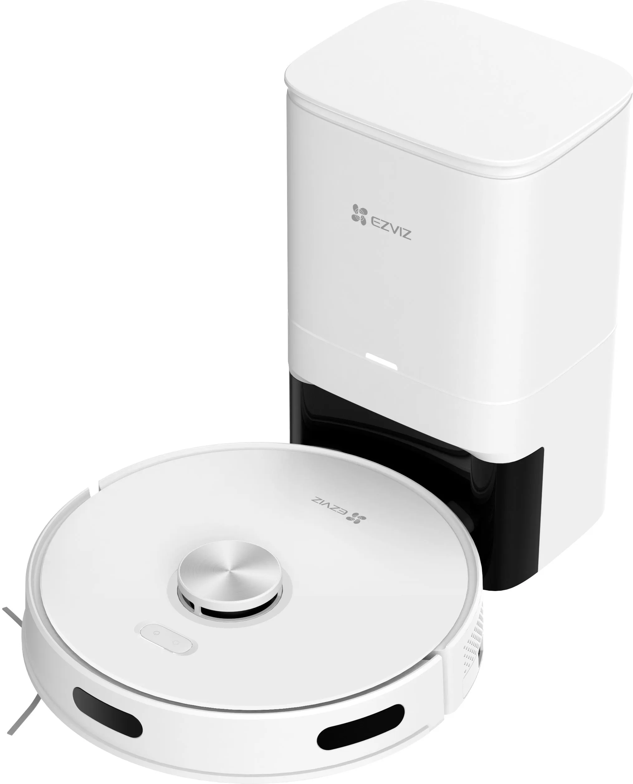 Biały odkurzacz automatyczny i stacja ładująca. Odkurzacz jest okrągły, stacja prostokątna.