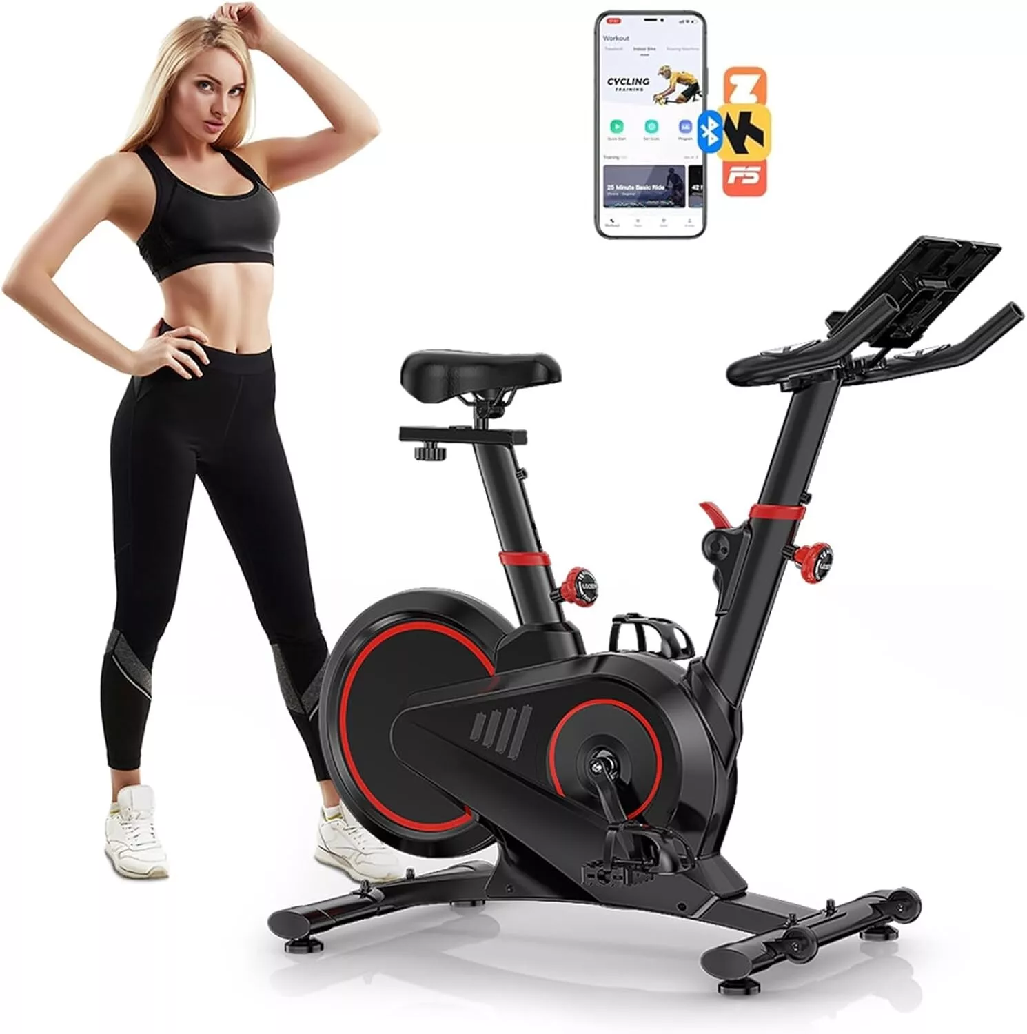 Kobieta w stroju do ćwiczeń stoi obok czarnego roweru treningowego z cyfrowym wyświetlaczem i aplikacjami fitness.