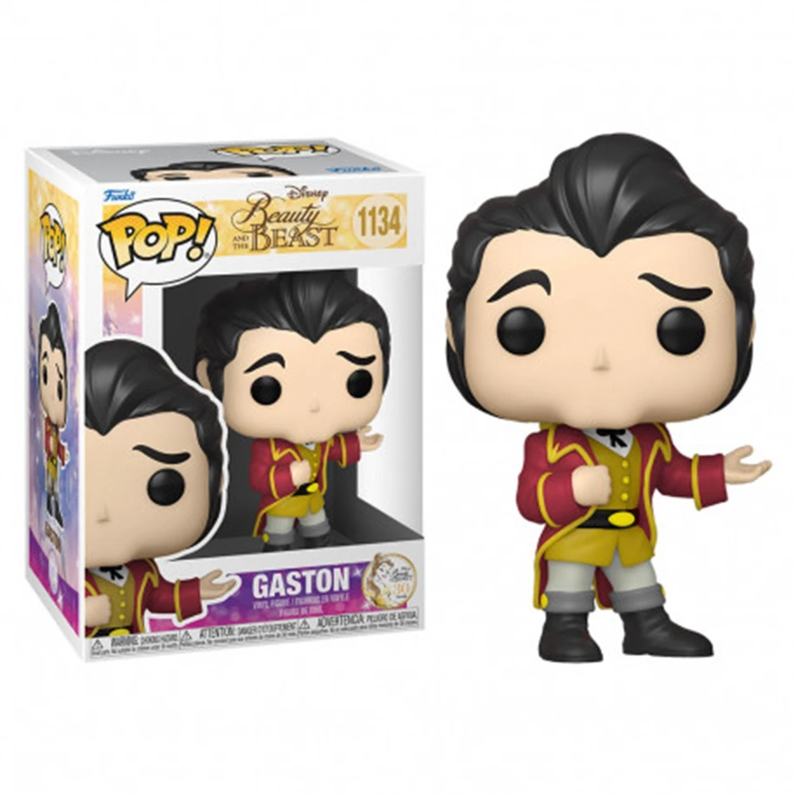 Figurka Funko Pop Gastona z Pięknej i Bestii stoi obok swojego pudełka. Gaston ma czarne włosy, czerwony płaszcz i żółtą koszulę.