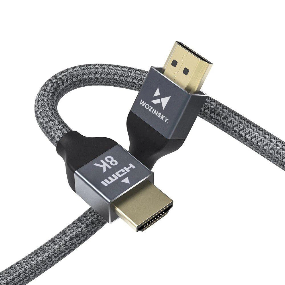 Kabel HDMI firmy Wozinsky. Kabel jest szary z czarnymi złączami. Złącza są złote, z HDMI i 8K.