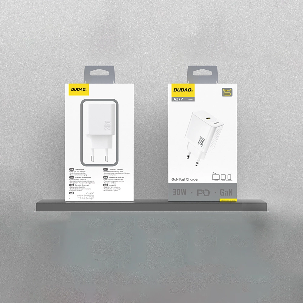 Dwa białe ładowarki DUDUO na półce. Jedna pokazuje obrazek.