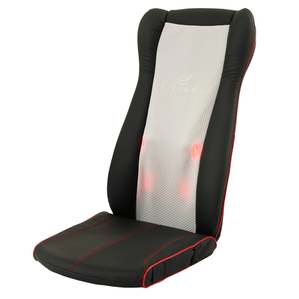 Czarny fotel masujący z czerwonymi szwami, białym środkiem i czerwonymi światłami.