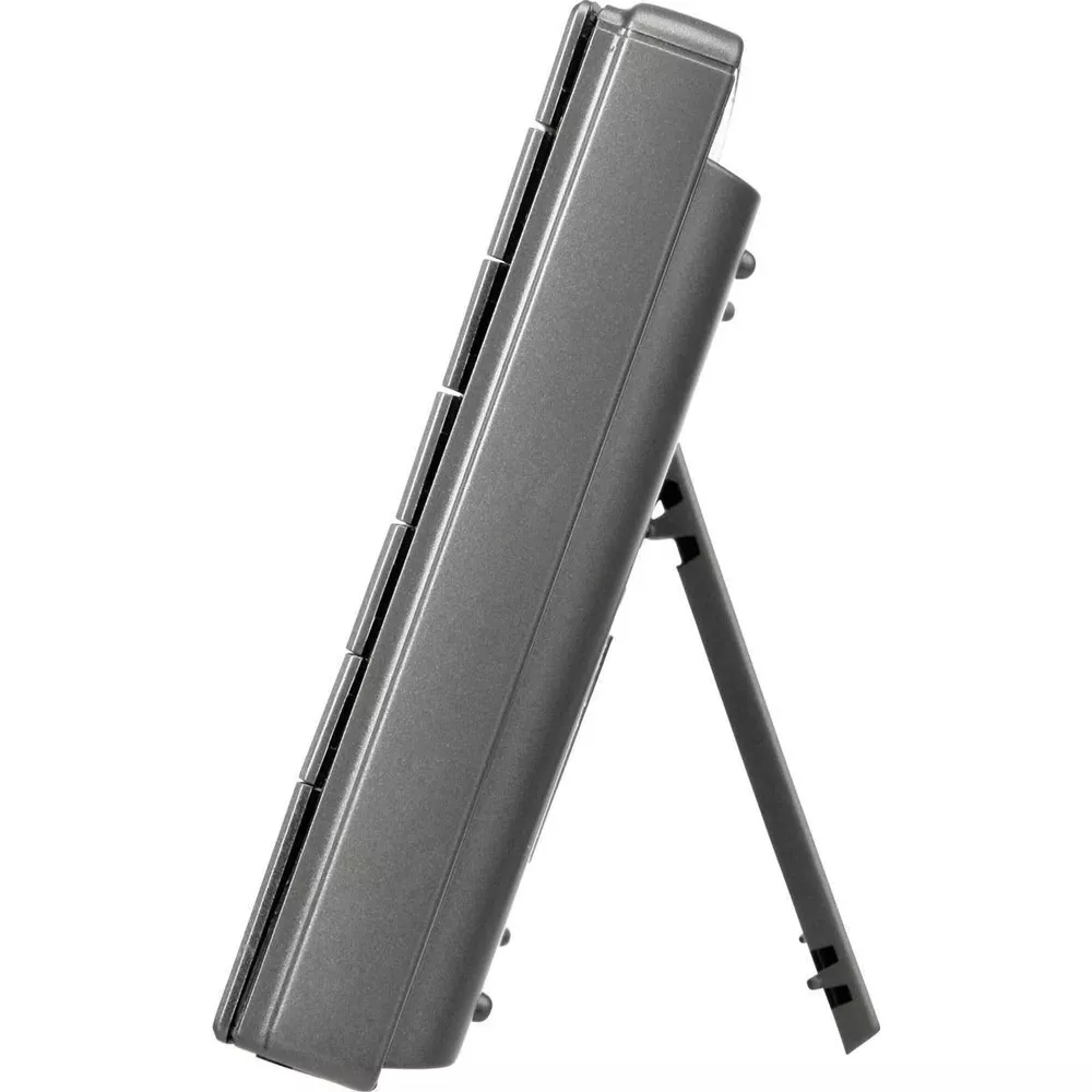 Widok z boku szarego urządzenia z wyświetlaczem cyfrowym i podstawką. Białe tło.