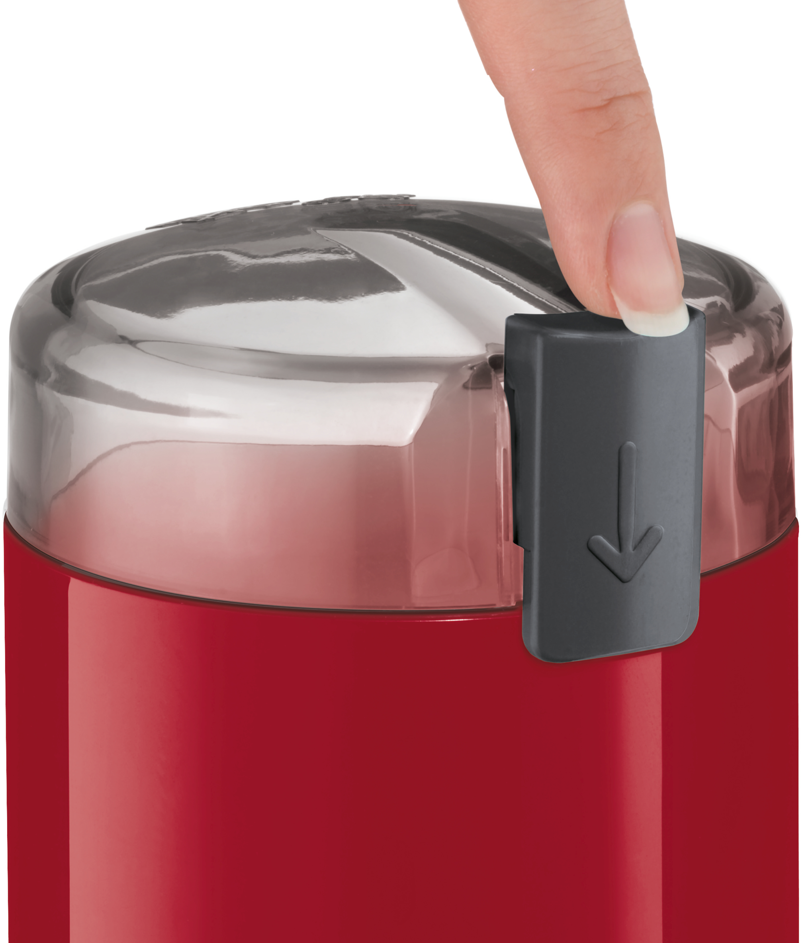 Der Finger einer Person drückt auf eine rot-graue Schleifmaschine.