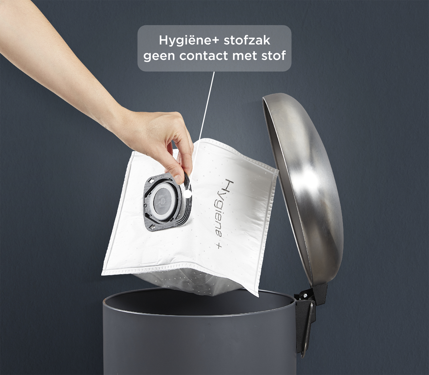 Hand removing a white dust bag from a gray vacuum cleaner, with a text overlay.