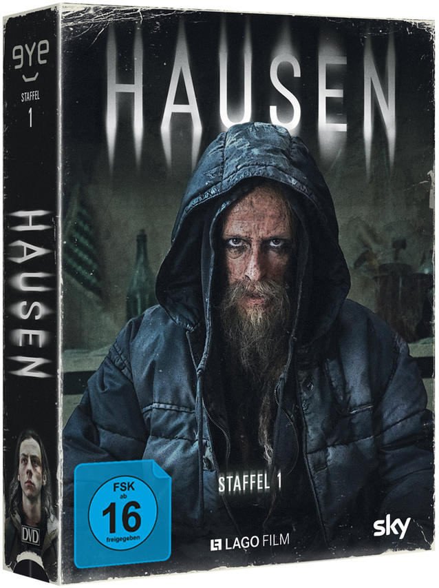 DVD-Cover der Fernsehserie 'Hausen'. Ein Mann mit Bart in einer Kapuzenjacke ist abgebildet.
