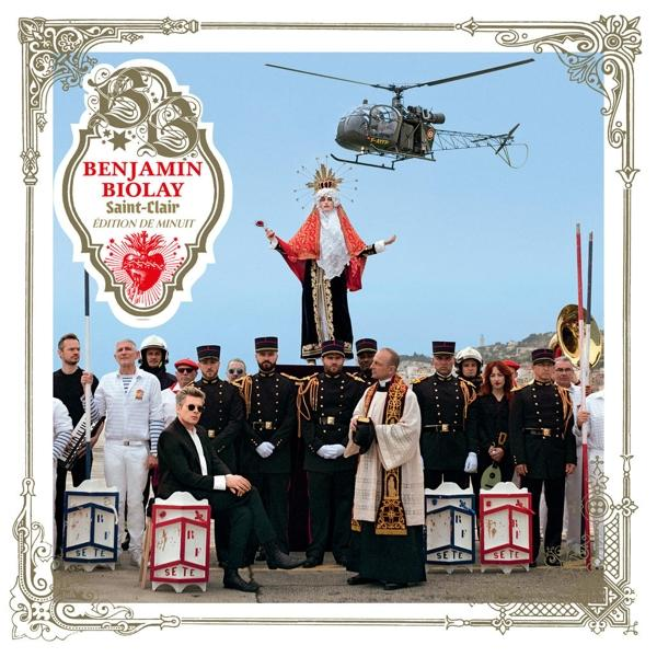 Albumhoes met een band en een heilige figuur. Een helikopter staat boven de scène.