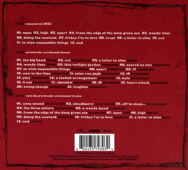 CD mit Titellisten. Text listet Songs und Details auf, mit Barcode unten.
