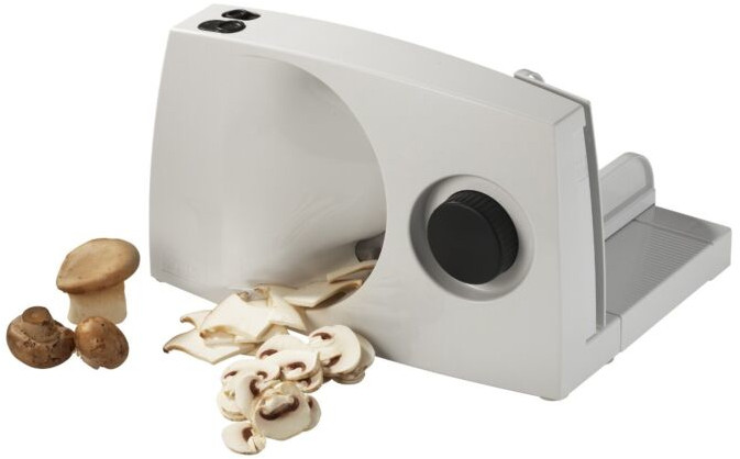 A white mushroom slicer with mushrooms and sliced mushrooms.