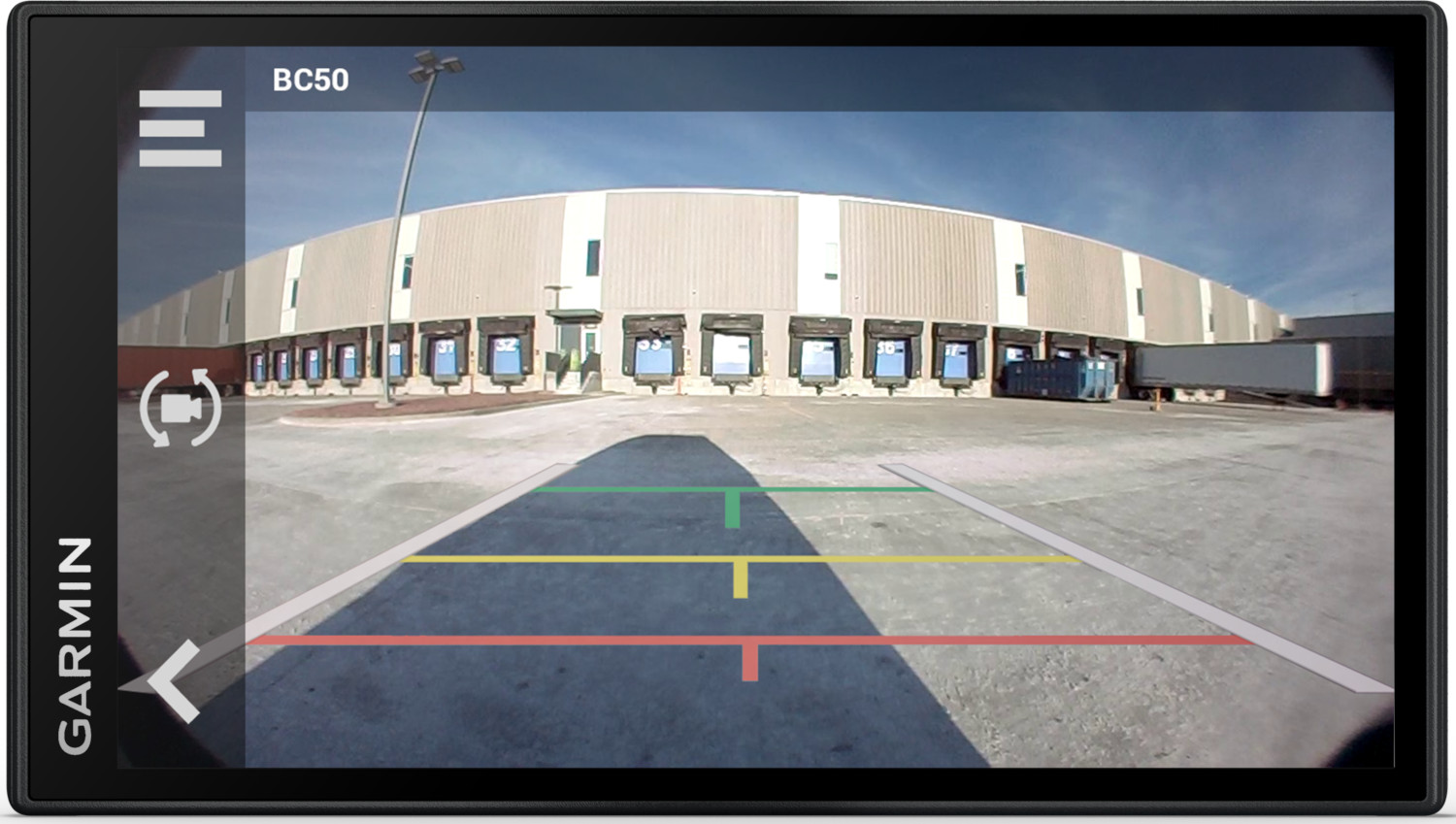 Garmin BC50 screen displaying a rear view of a truck bay area, showing parking lines.