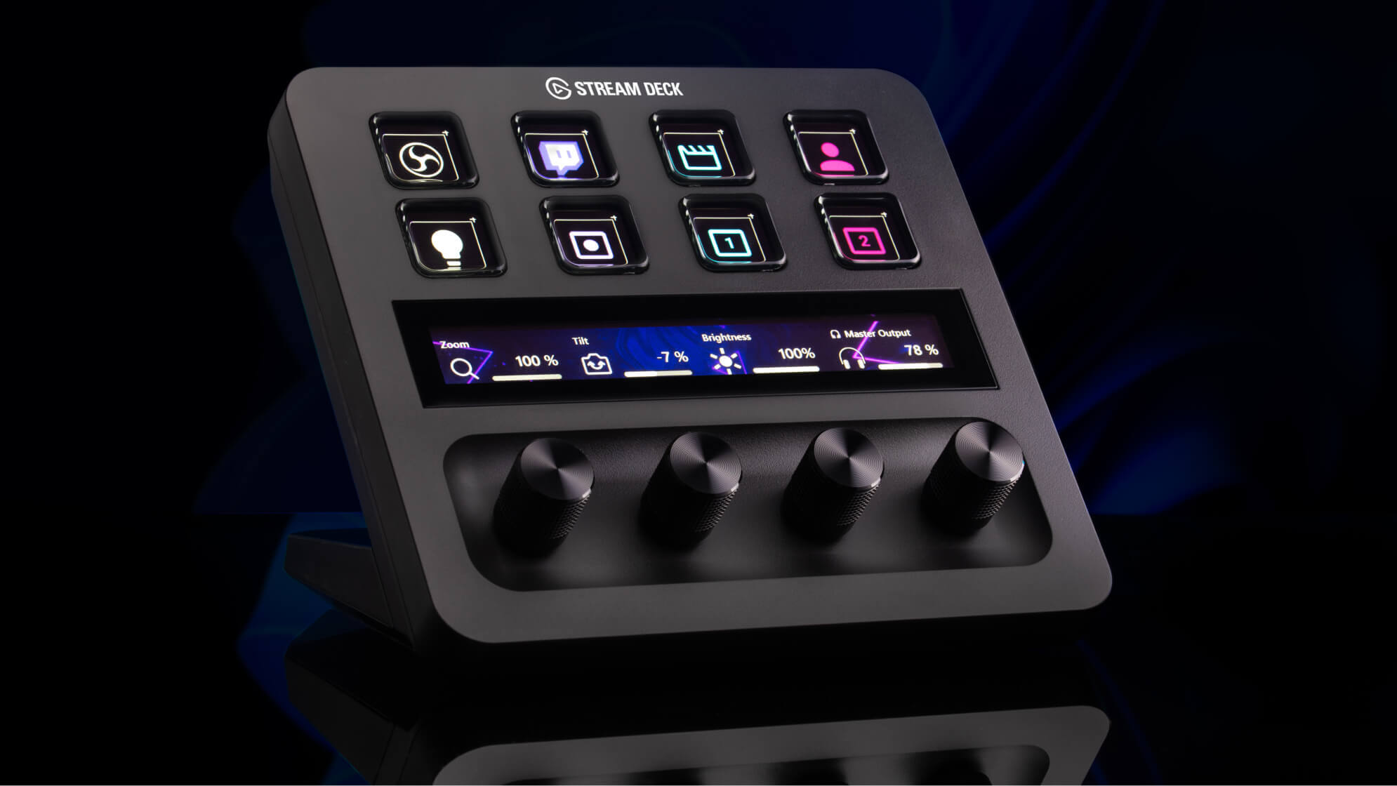 Schwarzes Stream Deck Gerät. Es hat mehrere Tasten, einen kleinen Bildschirm und Knöpfe.