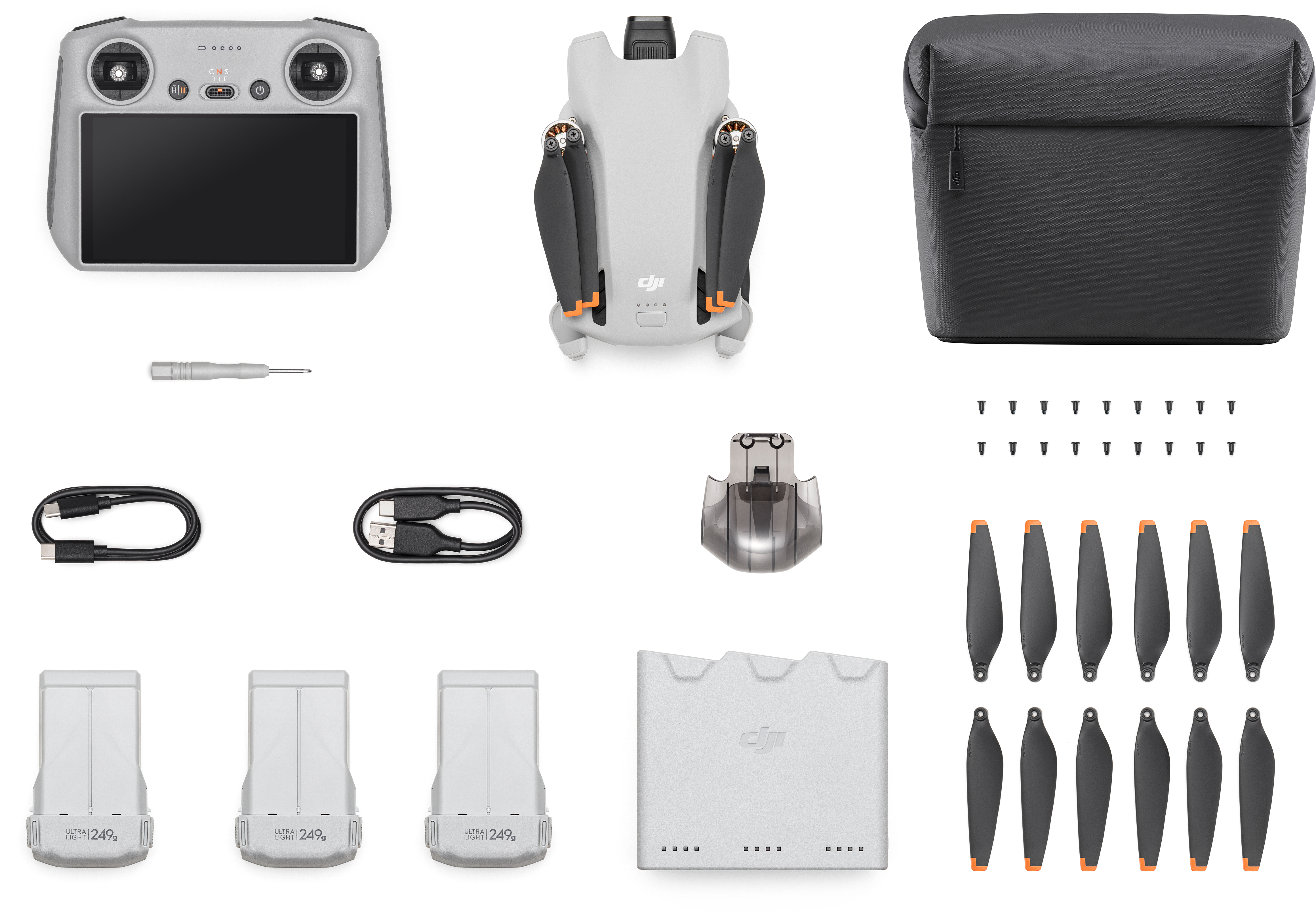 Drohnen-Kit mit Drohne, Fernbedienung, Batterien, Schraubendreher und Zubehör.