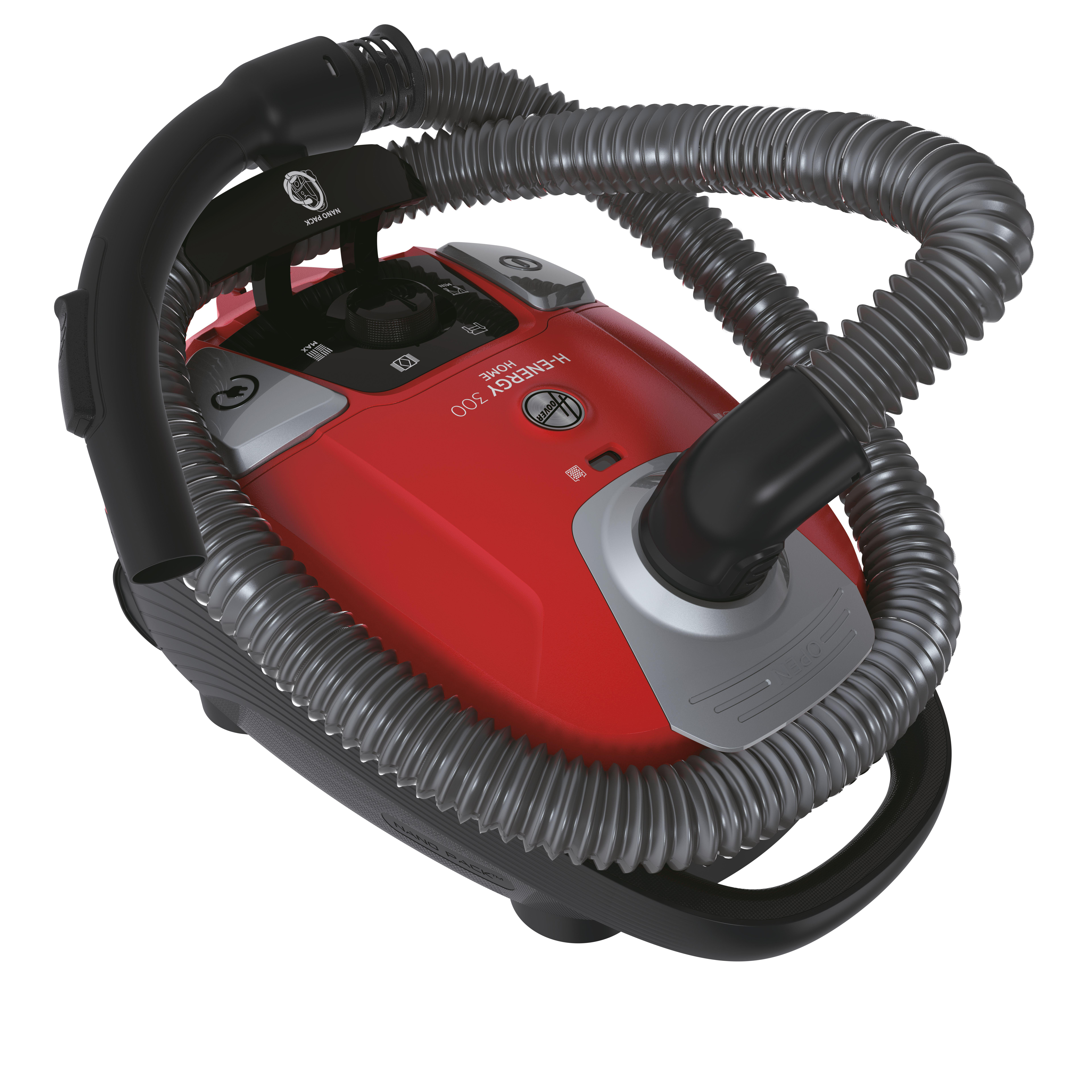Roter Staubsauger mit umwickeltem Schlauch. Griff oben.