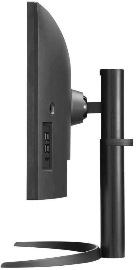 Vue latérale d'un moniteur d'ordinateur noir. Montrant les ports et le support. Fond blanc.