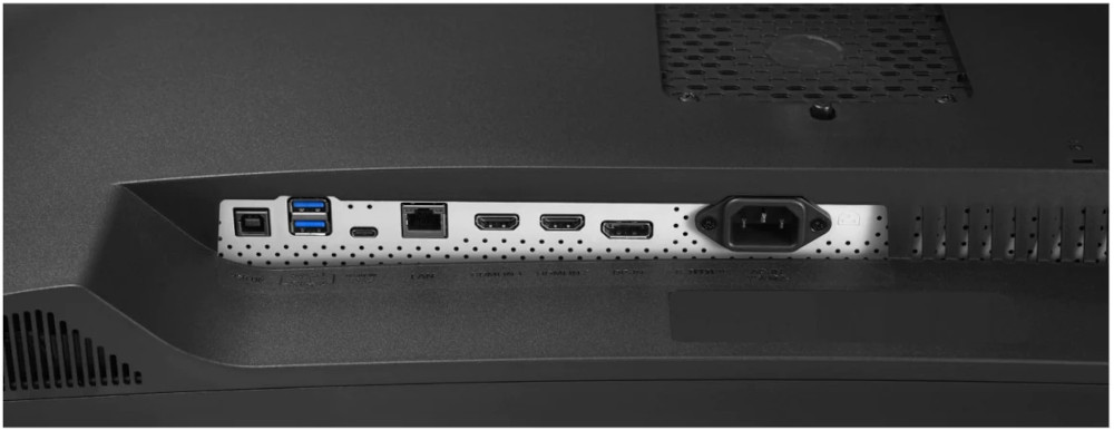 Arrière d'un moniteur avec divers ports, un port d'alimentation et un port USB.