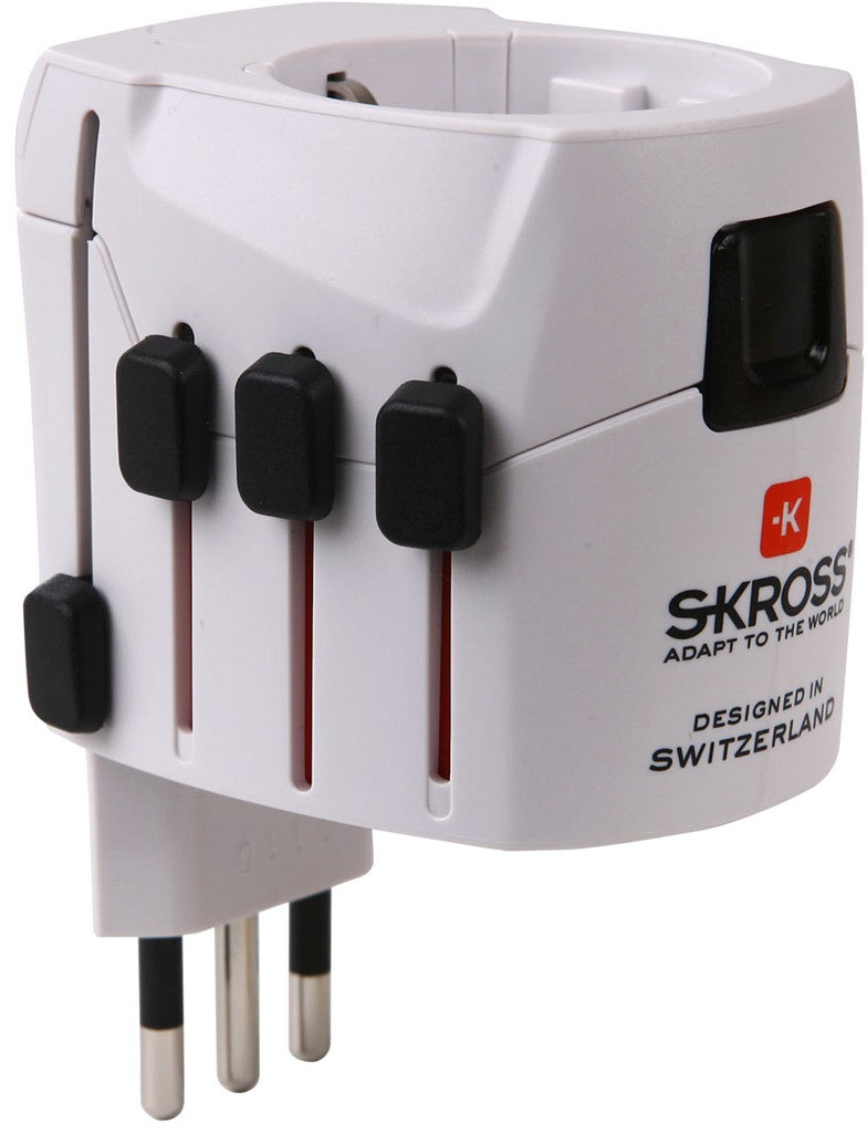 White travel adapter with black switches and text.