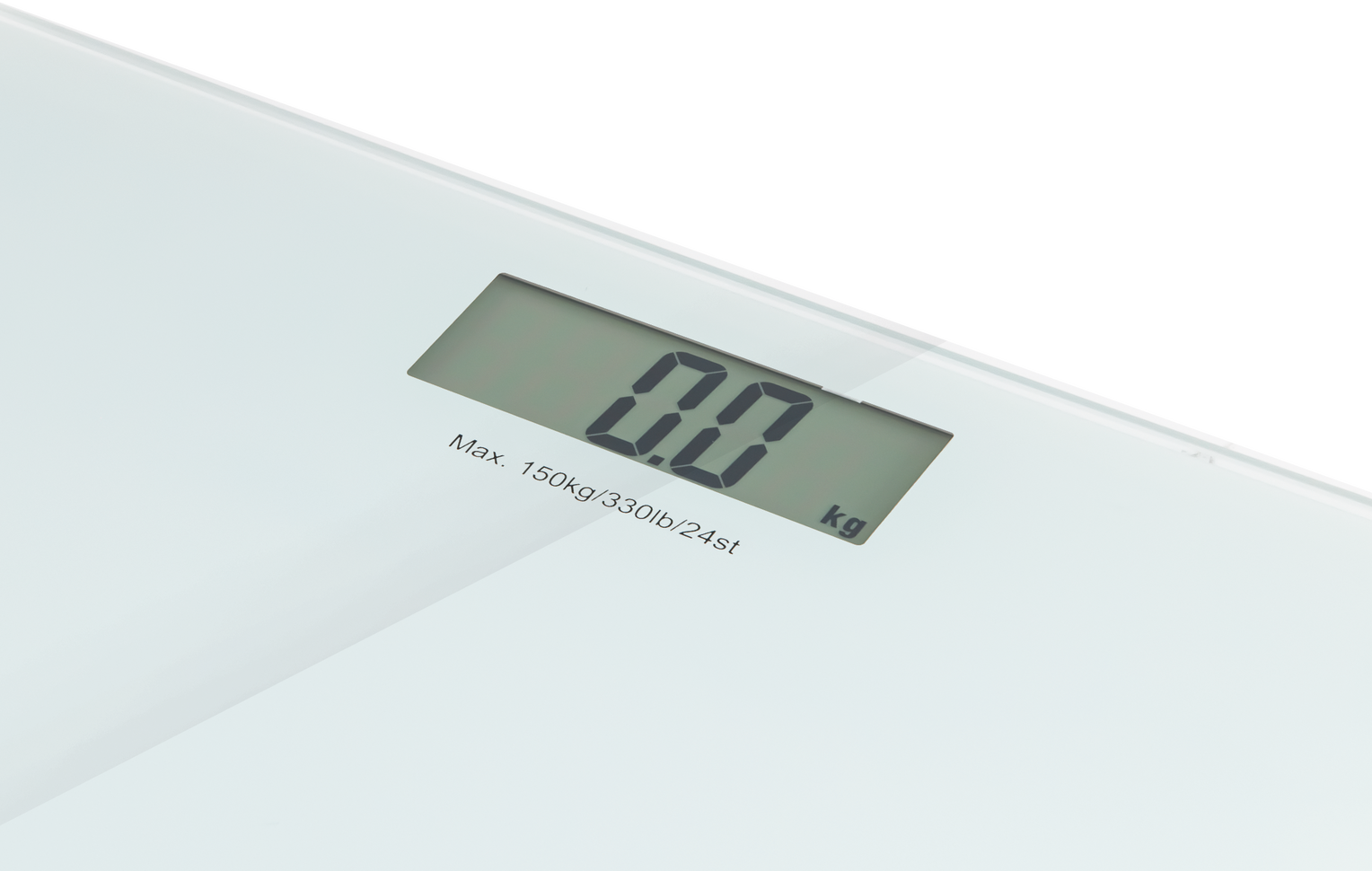 Une balance numérique blanche affichant 0,0 en kilogrammes.