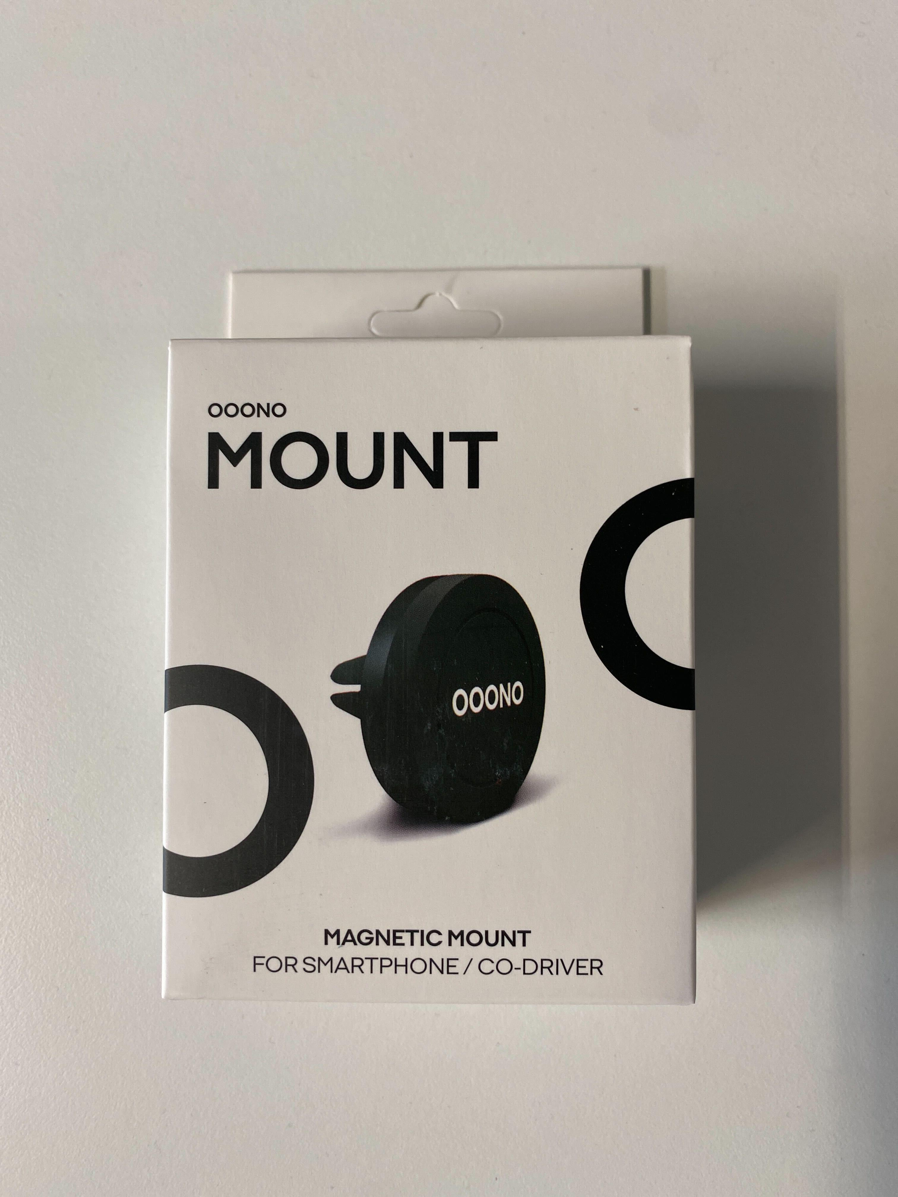 Schachtel für eine schwarze Magnethalterung, mit dem OOONO-Logo und Text.