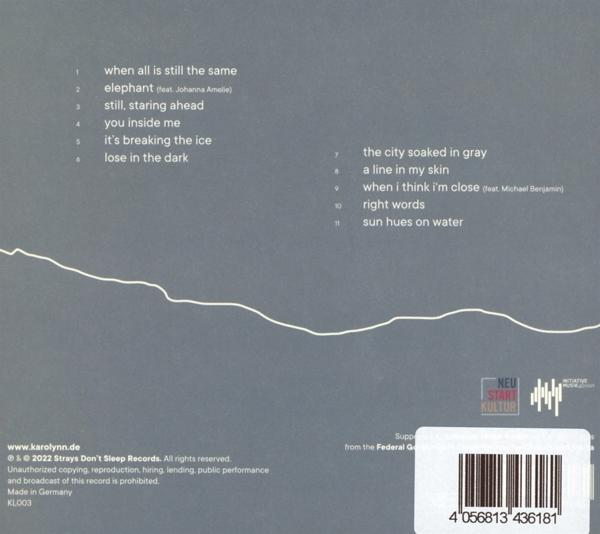 CD-Booklet mit Text und einer weißen Linie.