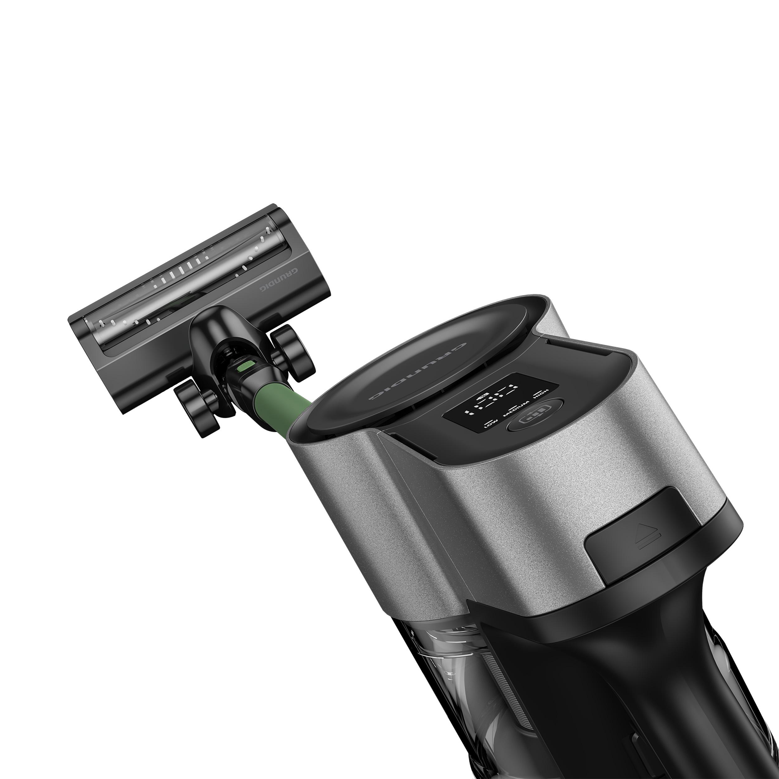 Schwarz-grauer Staubsauger mit grünem Griff.