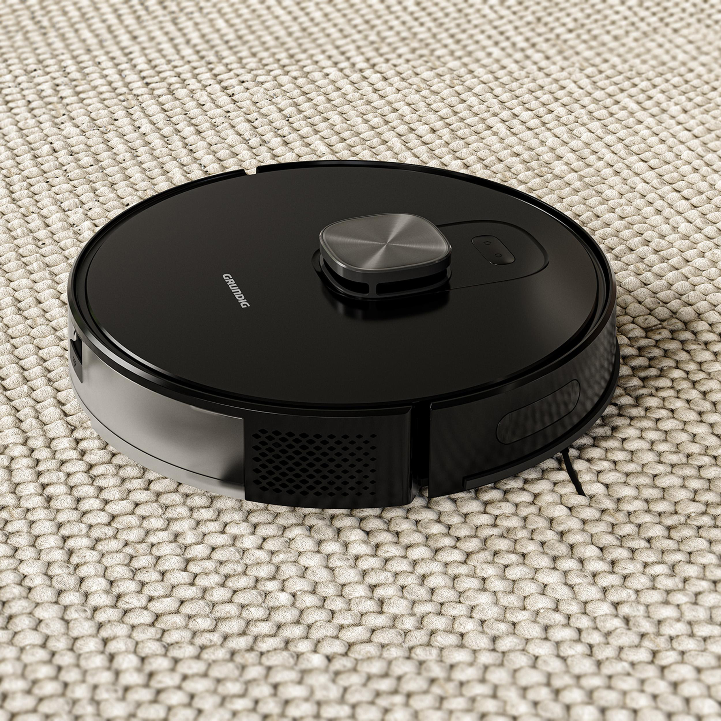 Schwarzer Roboter-Staubsauger auf beigem Teppich, Draufsicht mit Knopf und kreisförmigem Design.