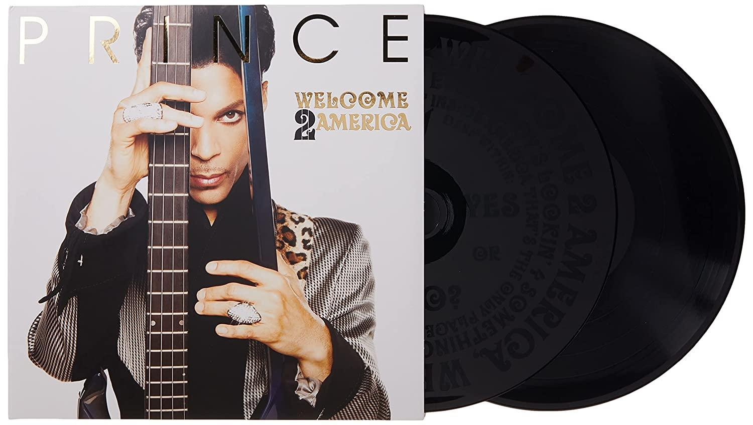 Albumcover mit Prince, der eine Gitarre hält, mit zwei schwarzen Schallplatten.