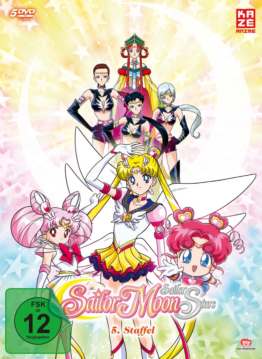 Sailor Moon Stars DVD-Cover mit sechs Anime-Charakteren. Sterne und ein Mond sind im Hintergrund sichtbar.