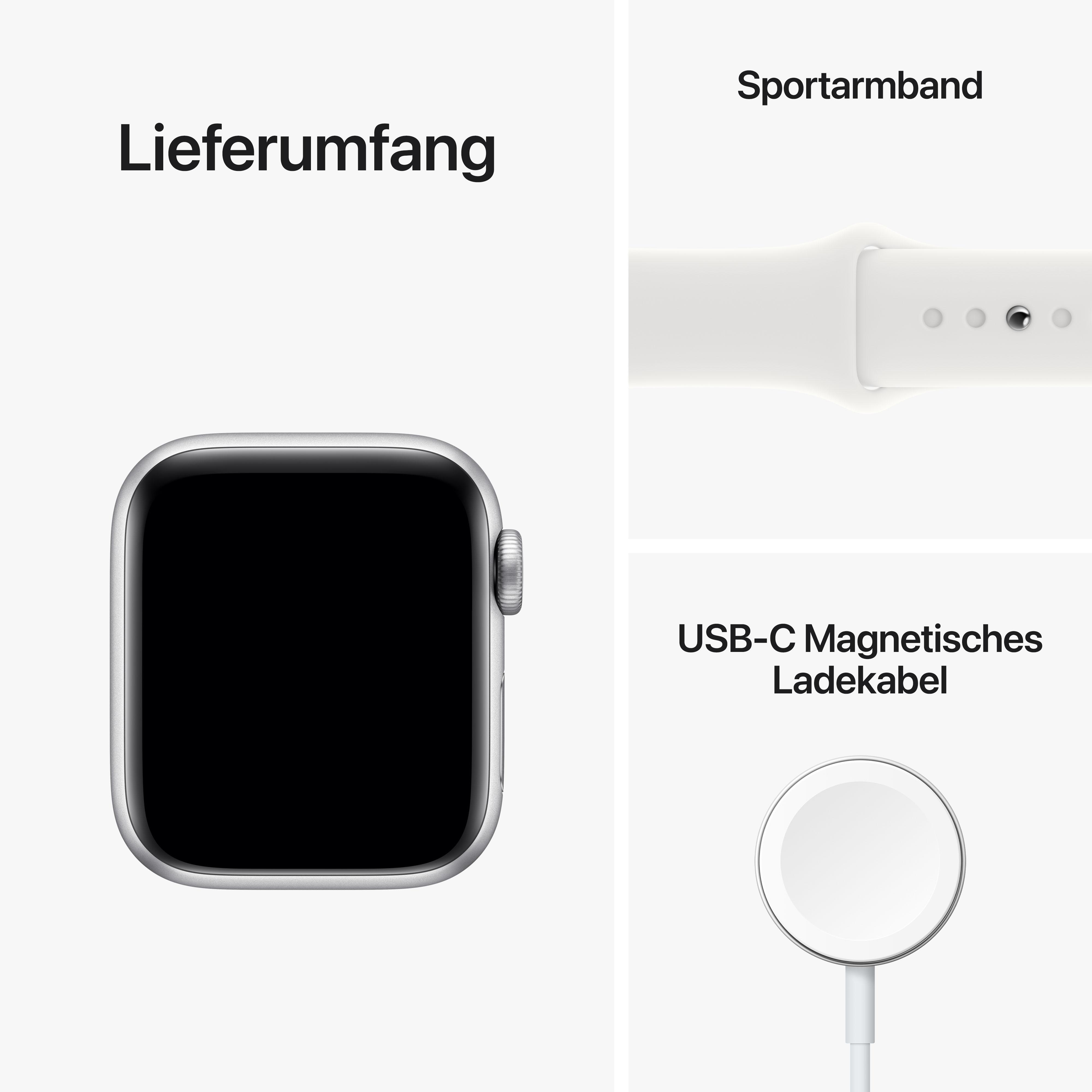Apple Watch mit weißem Sportarmband und USB-C-Ladekabel.