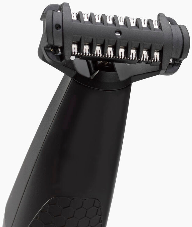 A close up of a black electric shaver head. Silver blades are visible. White background.