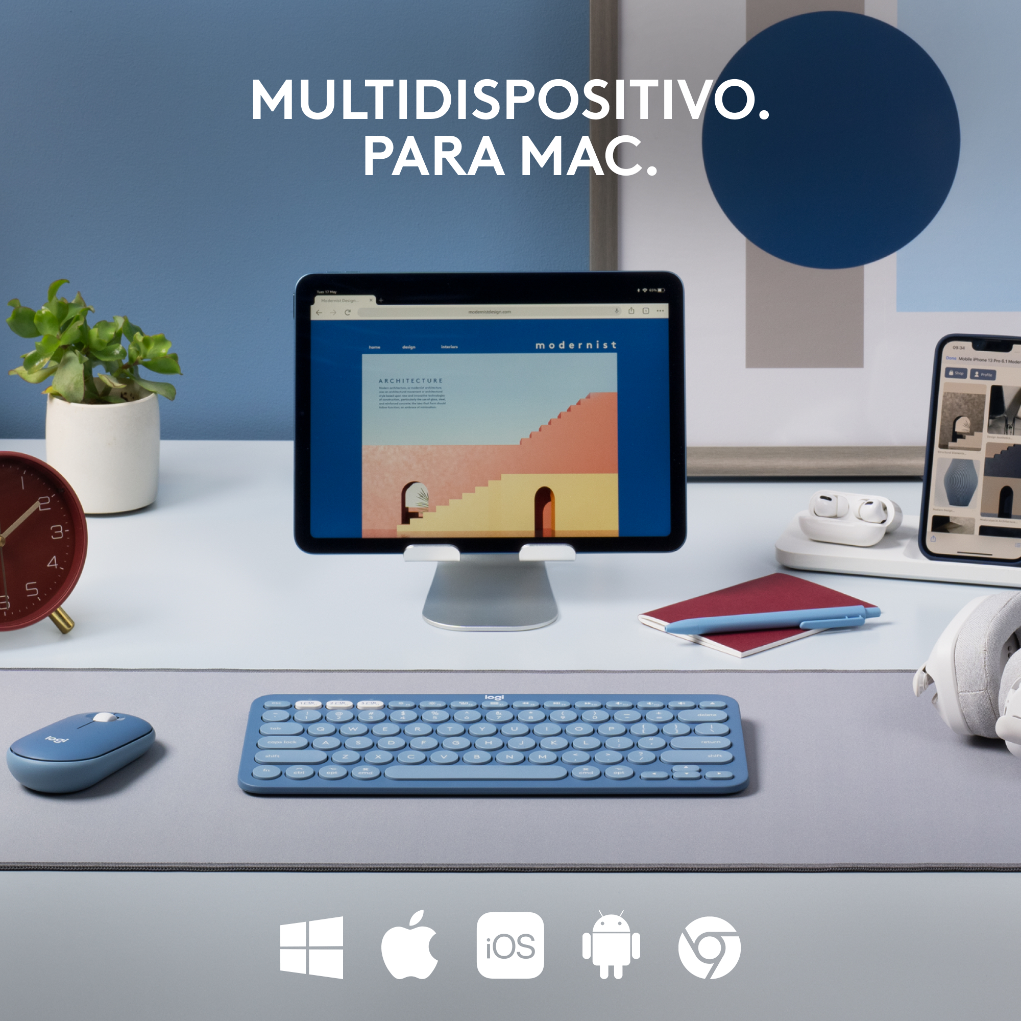 Una configuración de escritorio con tableta, teclado, ratón y otros accesorios. Esquema de colores azul y gris.