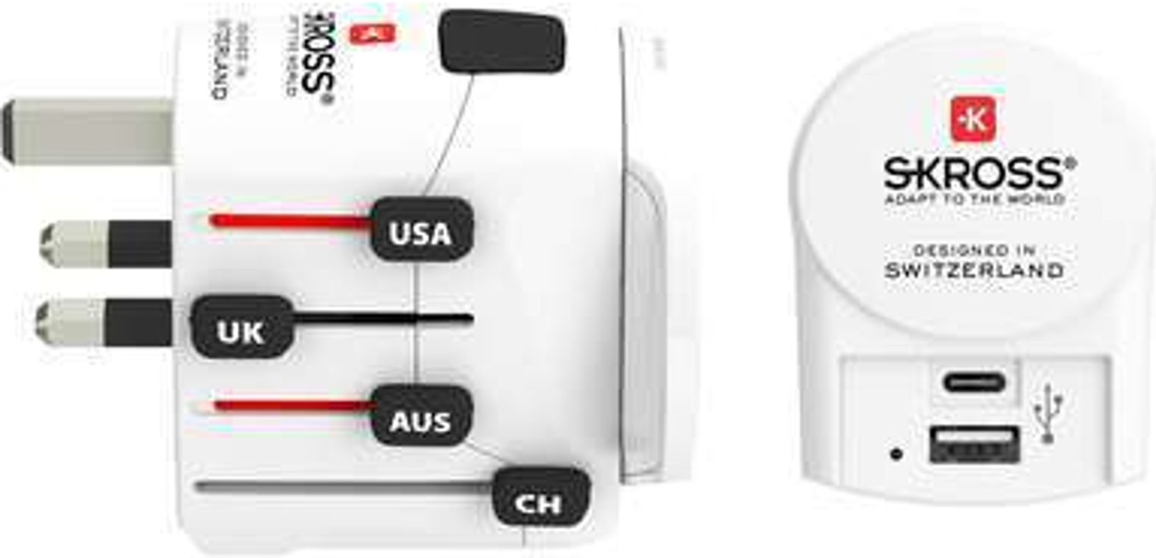 Ein weißer Reiseadapter mit Steckern für verschiedene Regionen. Der Adapter hat USB- und USB-C-Anschlüsse.