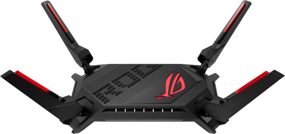 Fekete router négy antennával, piros részletekkel és ROG logóval.