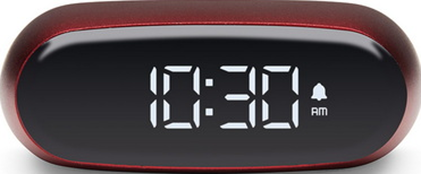 Una sveglia digitale rossa che mostra le 10:30. L'orologio ha una forma arrotondata.