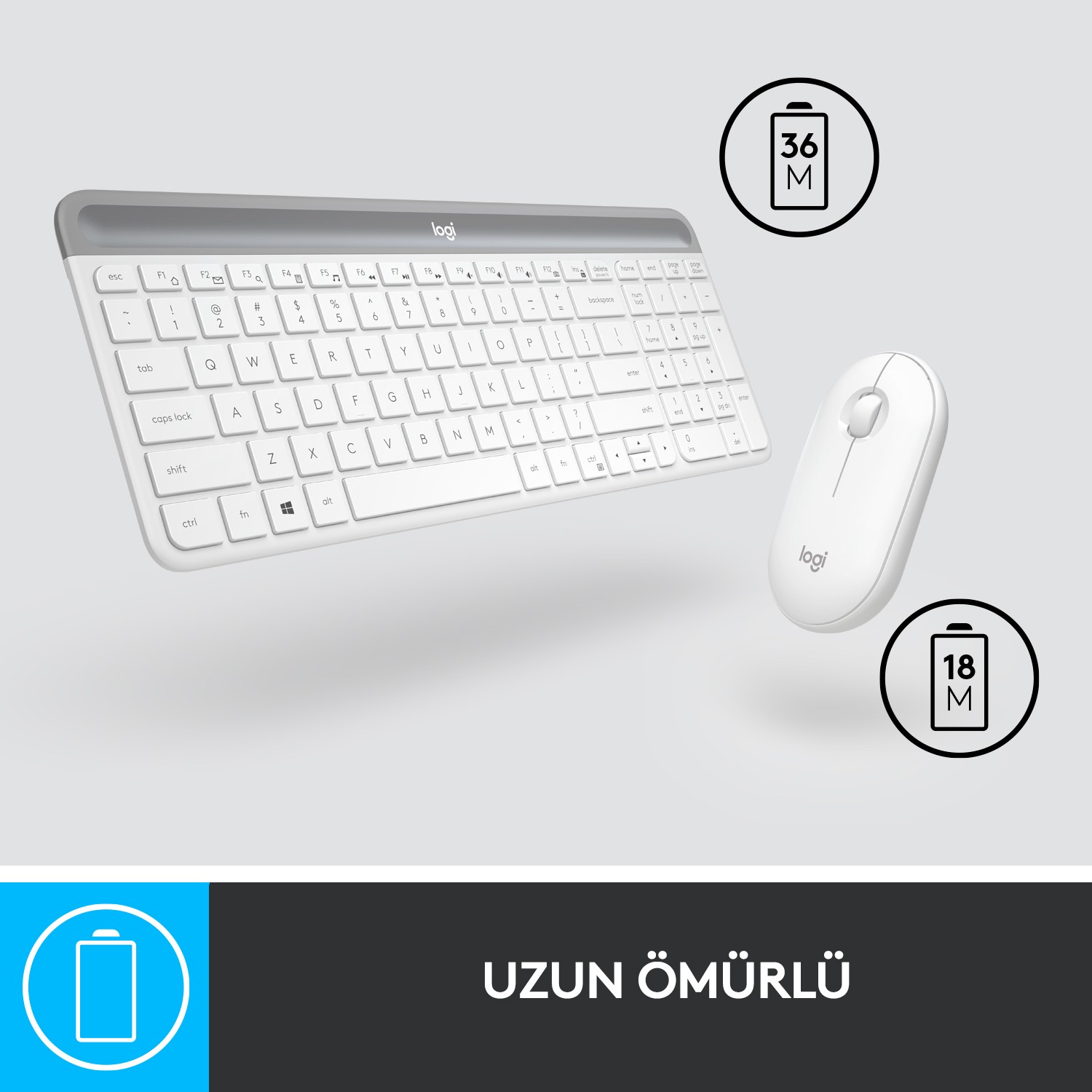 Pil ömrü göstergeleri olan beyaz bir Logitech klavye ve fare seti. Arka plan açık gri.