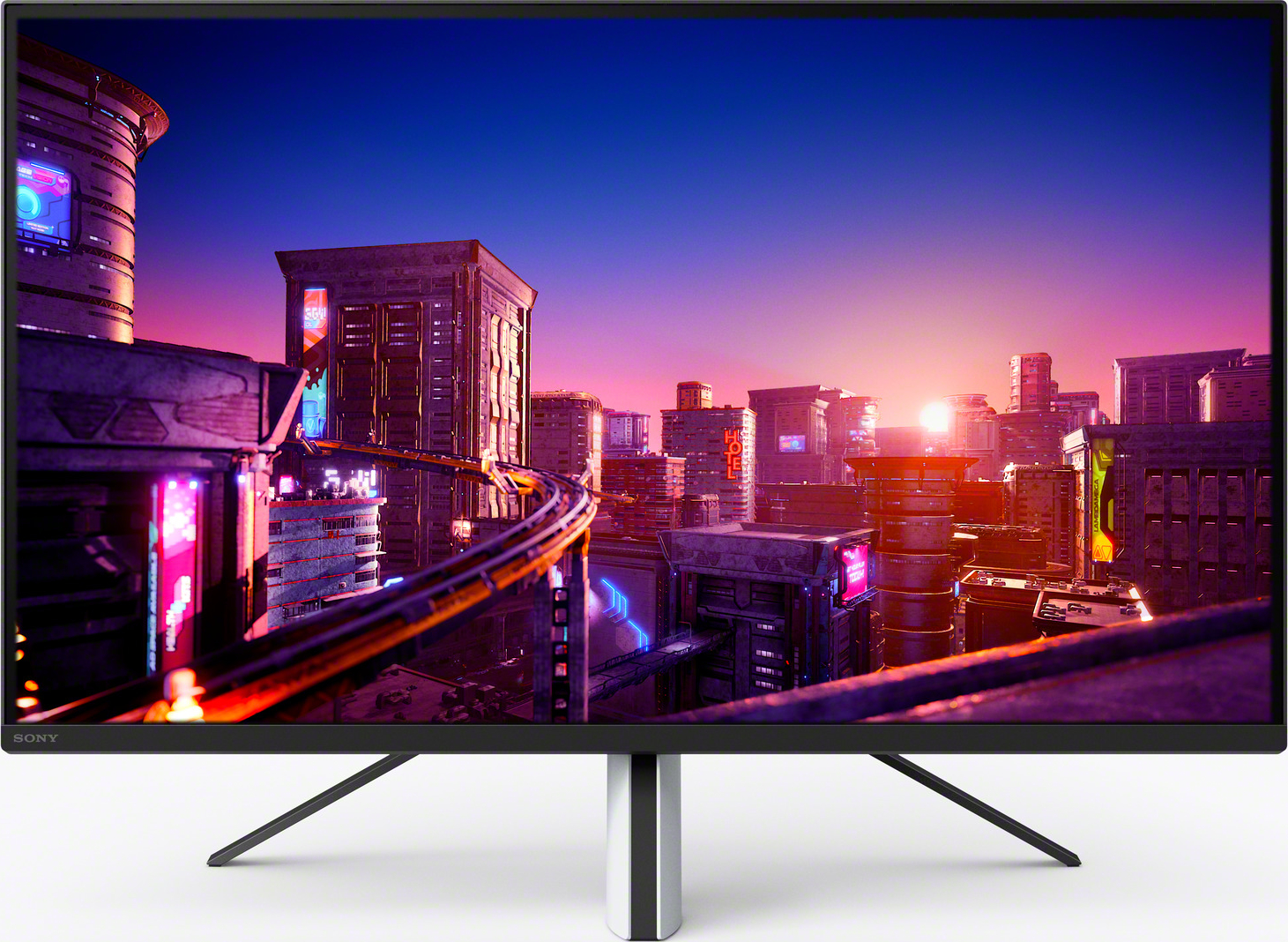Gaming-Monitor, der eine futuristische Stadtlandschaft mit Neonlichtern und Sonnenuntergang zeigt.