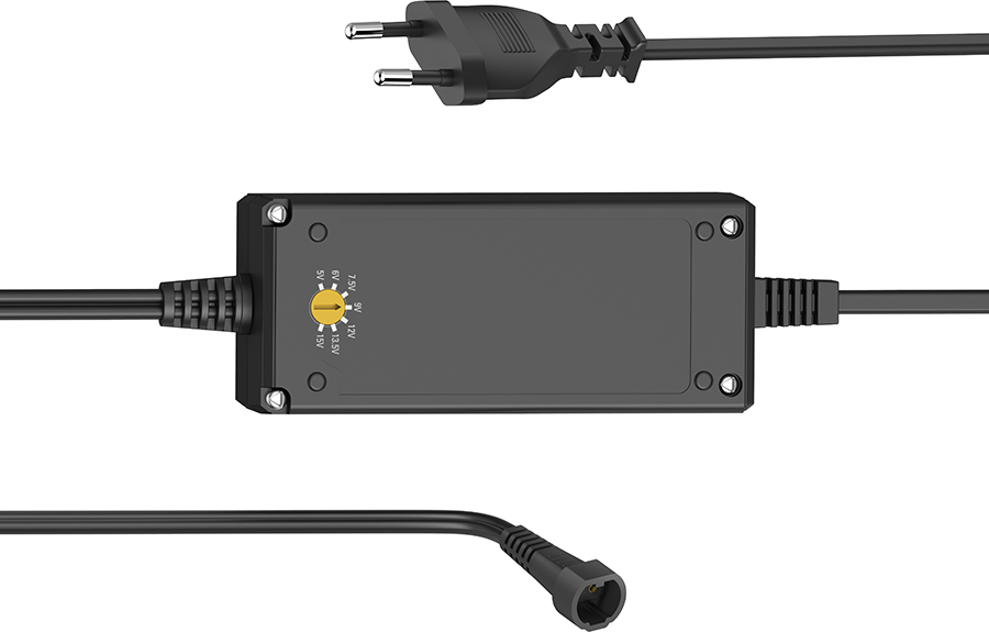 Black power adapter with cables and plug on white background.