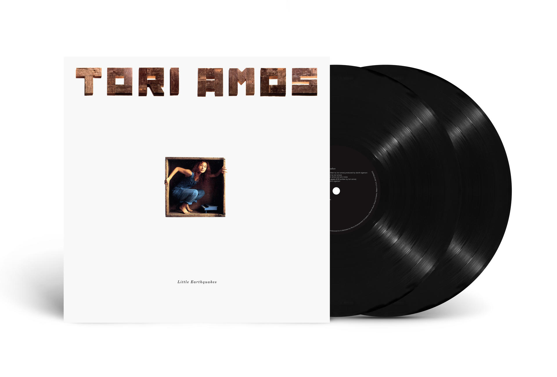 Tori Amos Albumcover, weiß mit Text und einem Foto von ihr.