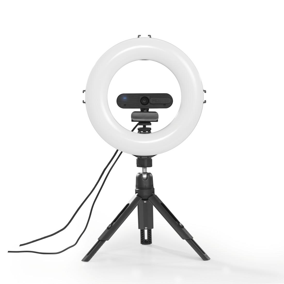 Ringlicht mit Webcam in der Mitte, montiert auf einem Stativ auf weißem Hintergrund.