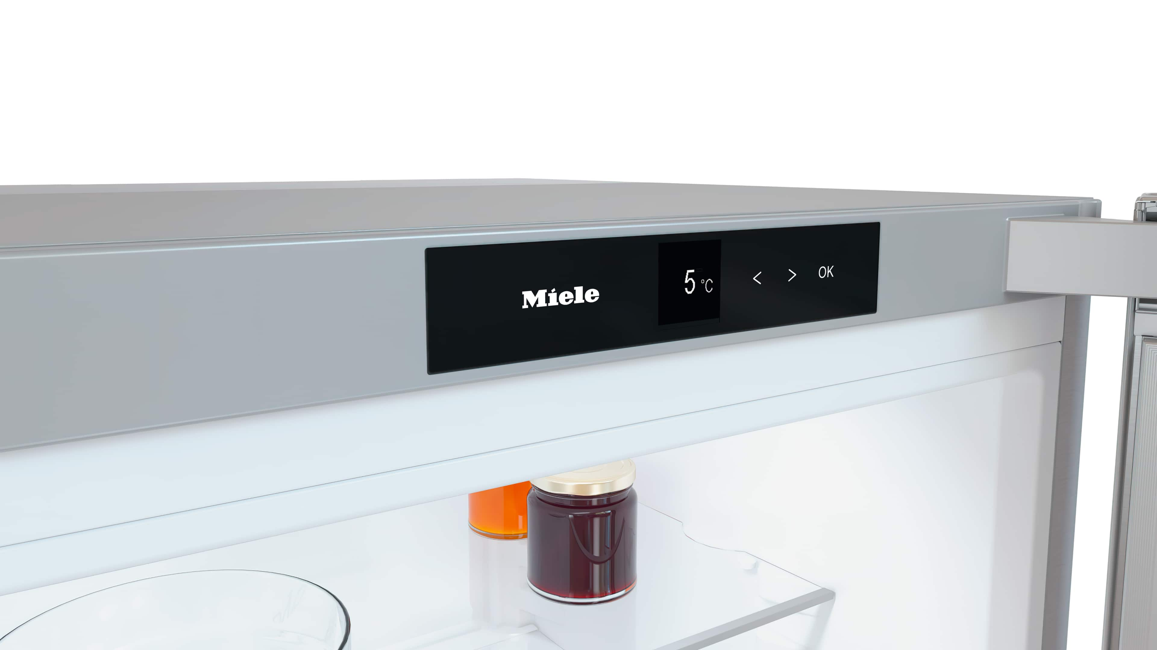 Miele Kühlschrank-Innenraum mit Digitalanzeige (5°C). Marmeladengläser sichtbar.