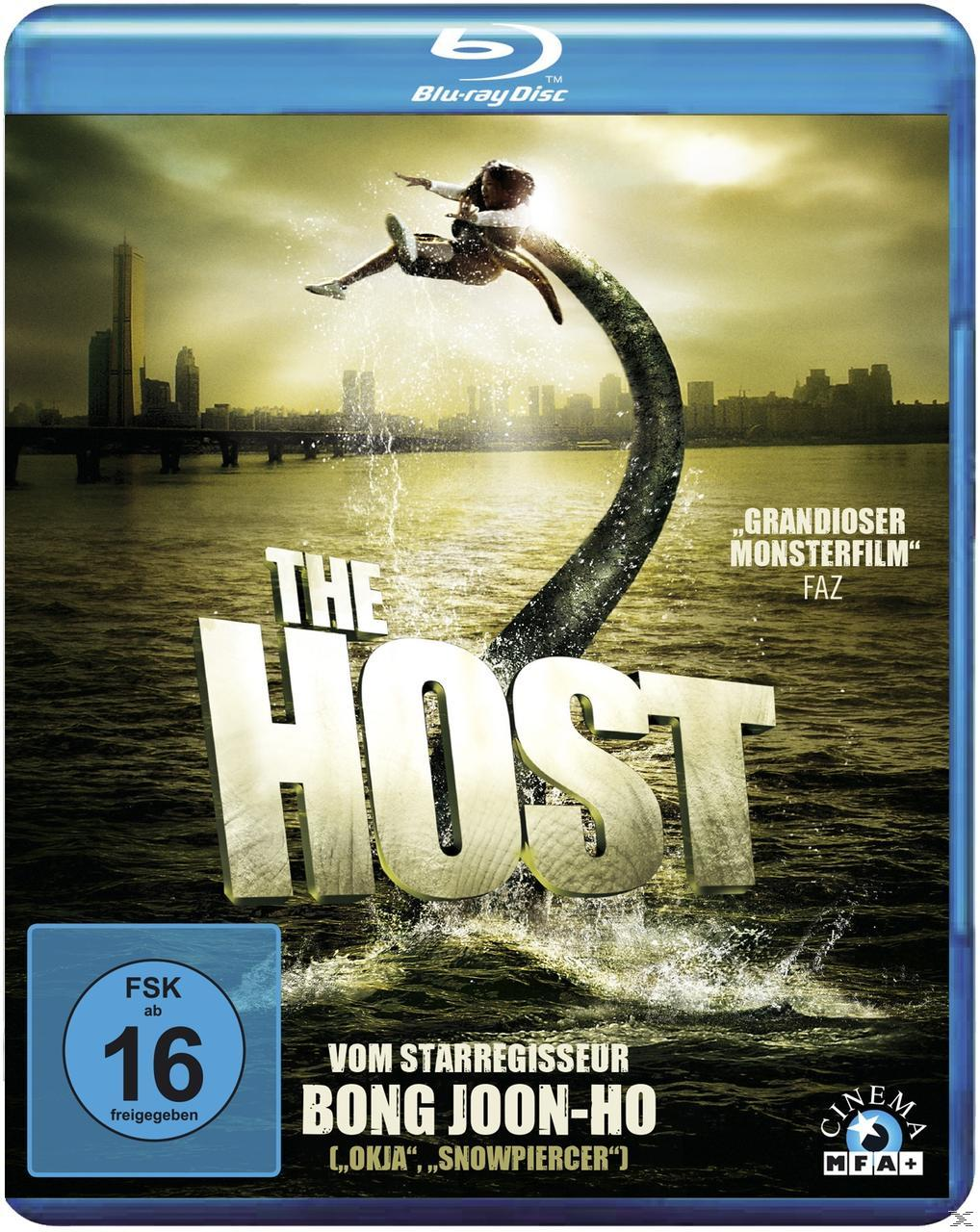 Filmplakat: 'The Host', eine Kreatur taucht aus dem Wasser auf. Blauer Hintergrund.