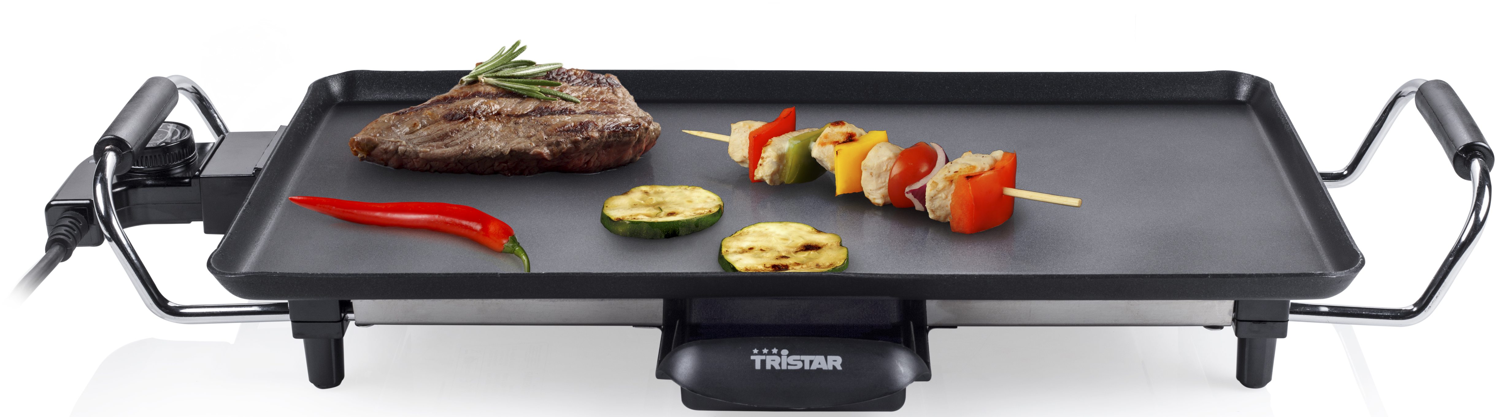 Un grill électrique avec un steak, des légumes et une brochette. Les poignées et le cordon d'alimentation sont visibles.