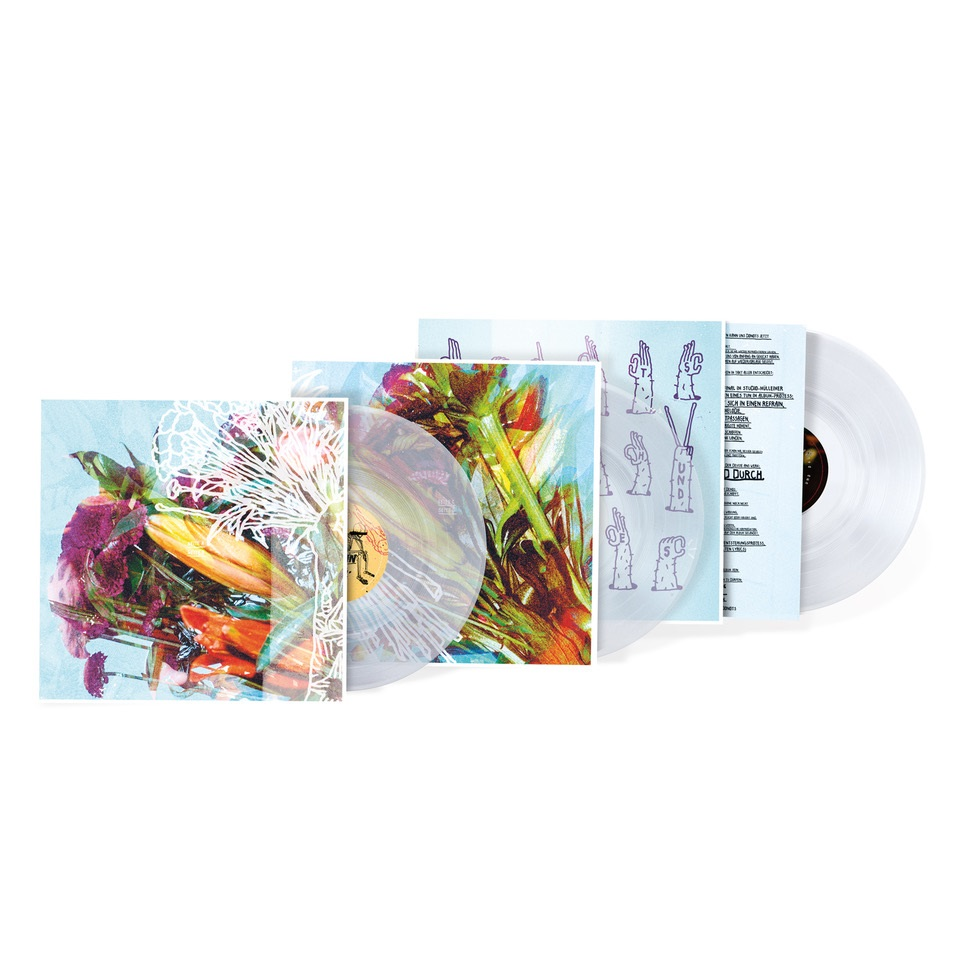Ein Vinyl-Schallplattenset mit transparenter Scheibe. Das Cover-Artwork zeigt bunte Blumen und einen floralen Hintergrund.