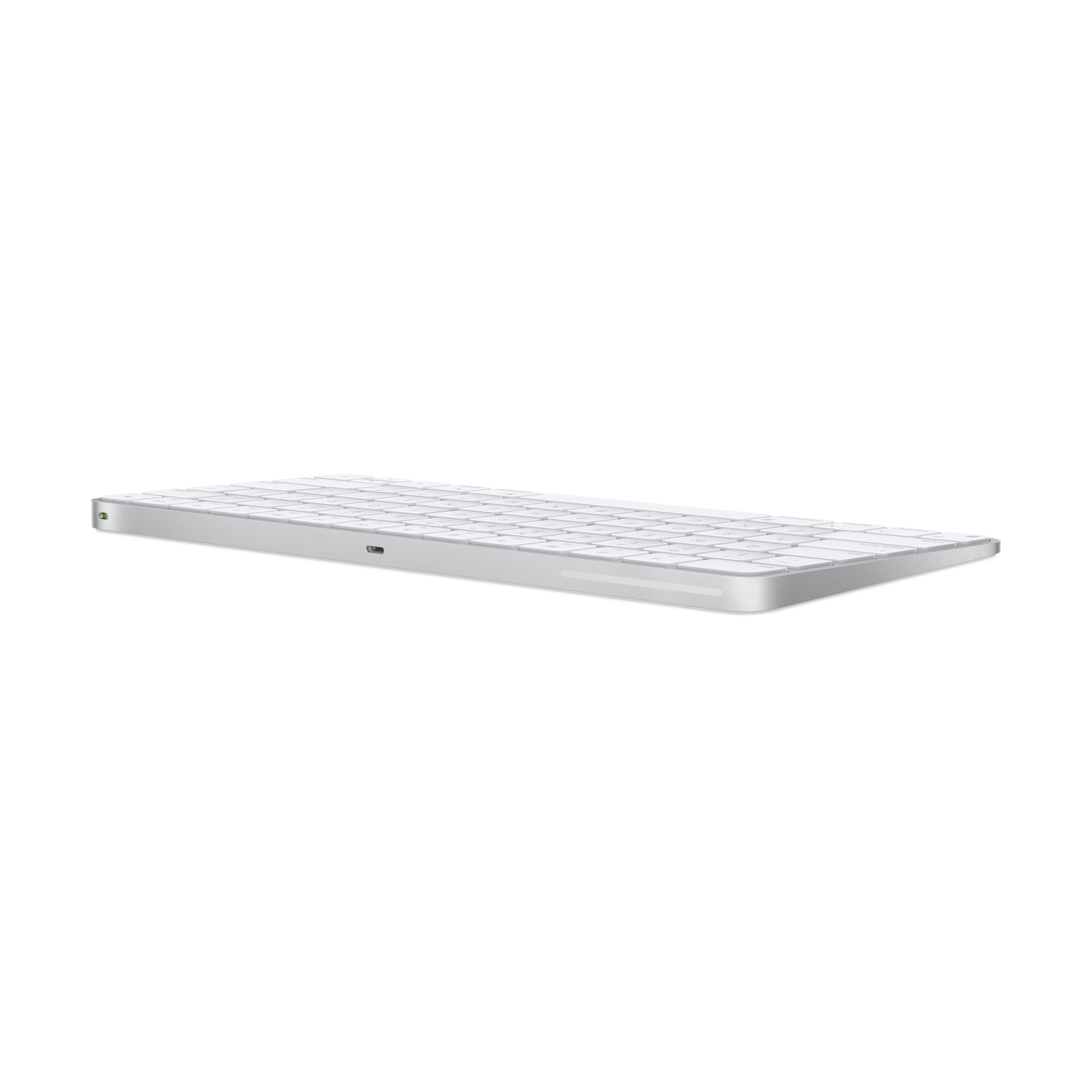 Zilveren Apple Magic Keyboard, zijaanzicht, op witte achtergrond.