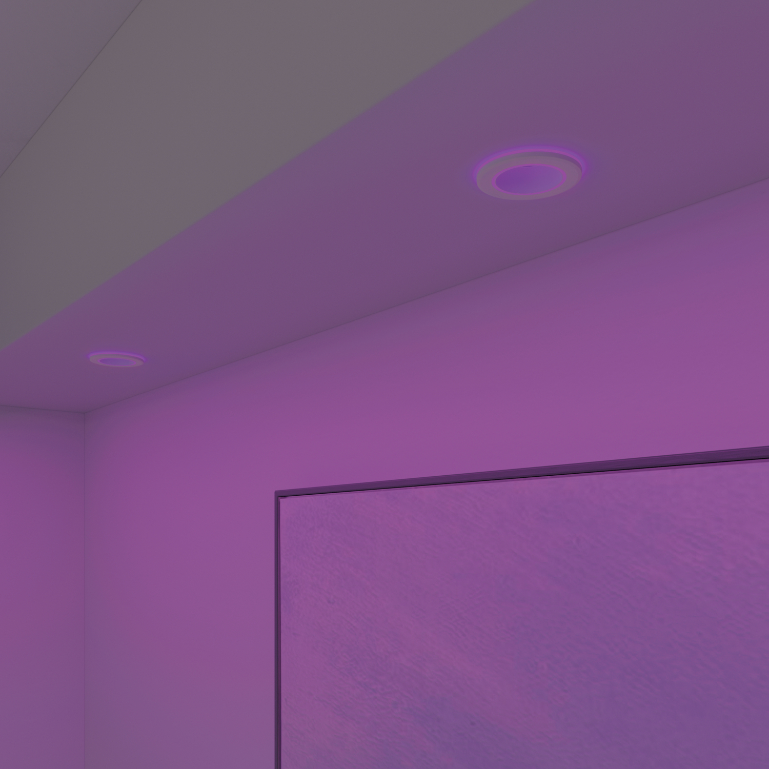 Recessed ceiling lights, emitting purple light on a white wall.