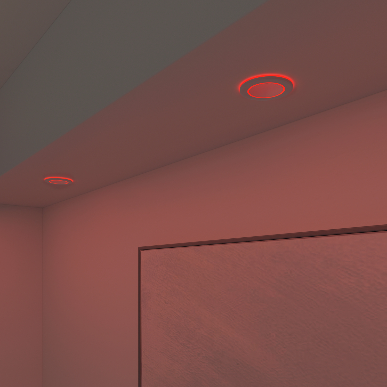 Two red-lit circular lights are on a white ceiling. The wall is a light red hue.