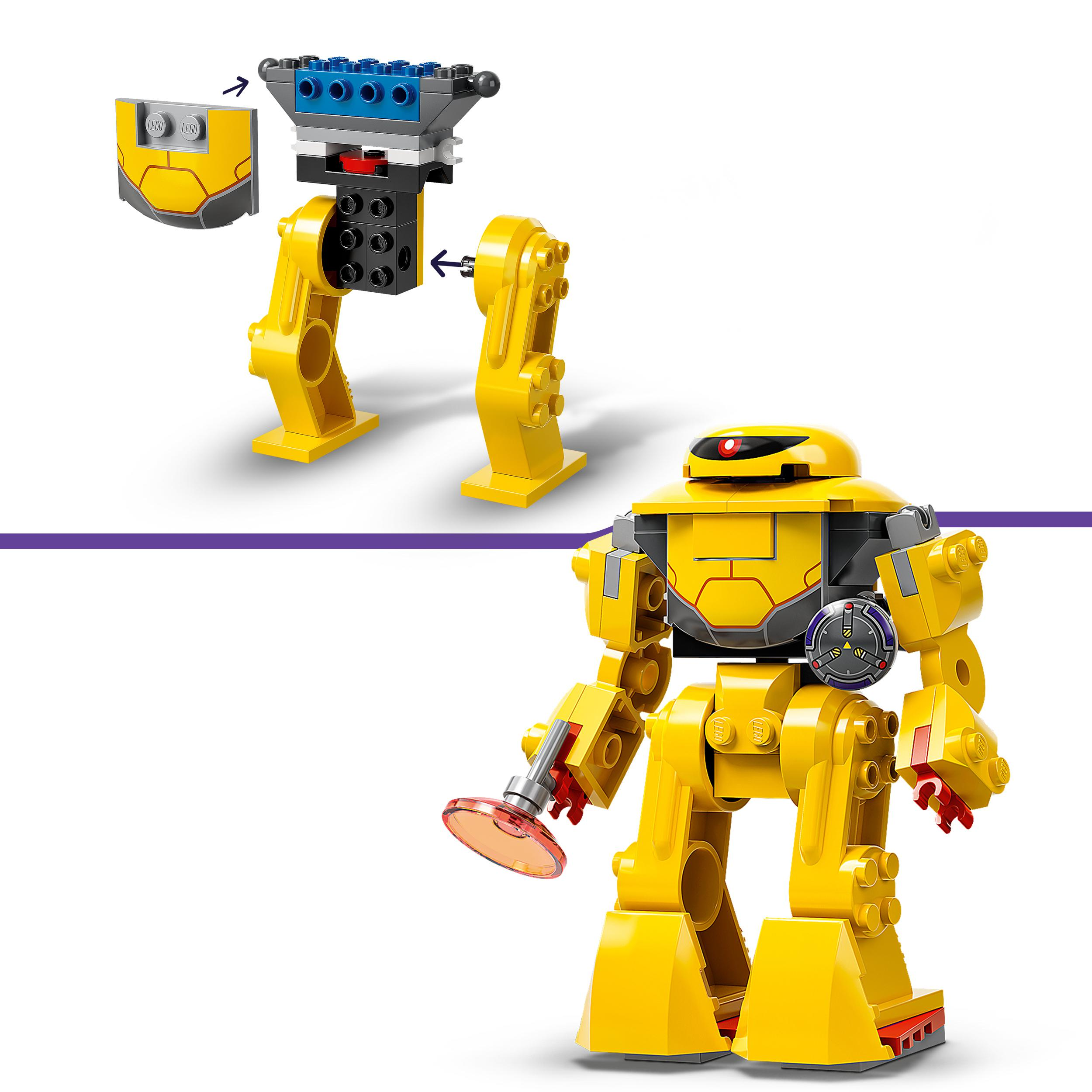 Ein gelber Lego-Roboter wird zusammengebaut, mit Anweisungen.