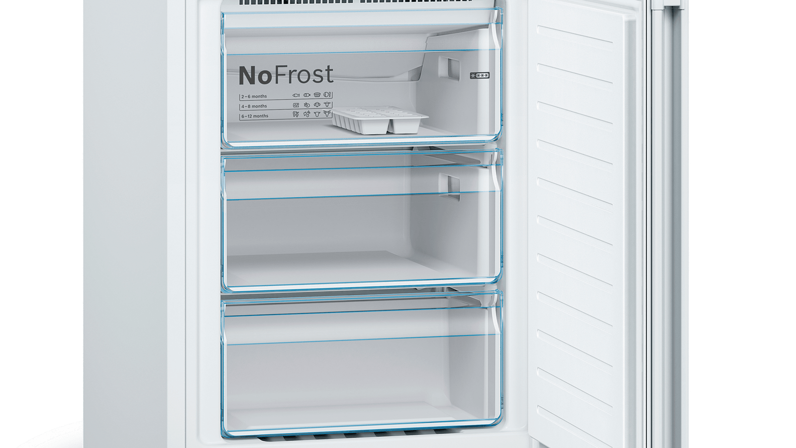 Un frigorífico blanco abierto. Hay tres cajones. El cajón superior dice NoFrost.