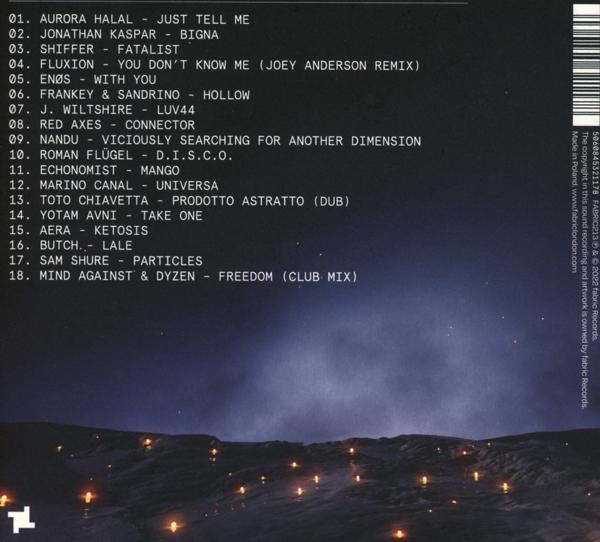 Dos d'un album de musique avec titres de morceaux et crédits, sur une scène nocturne.