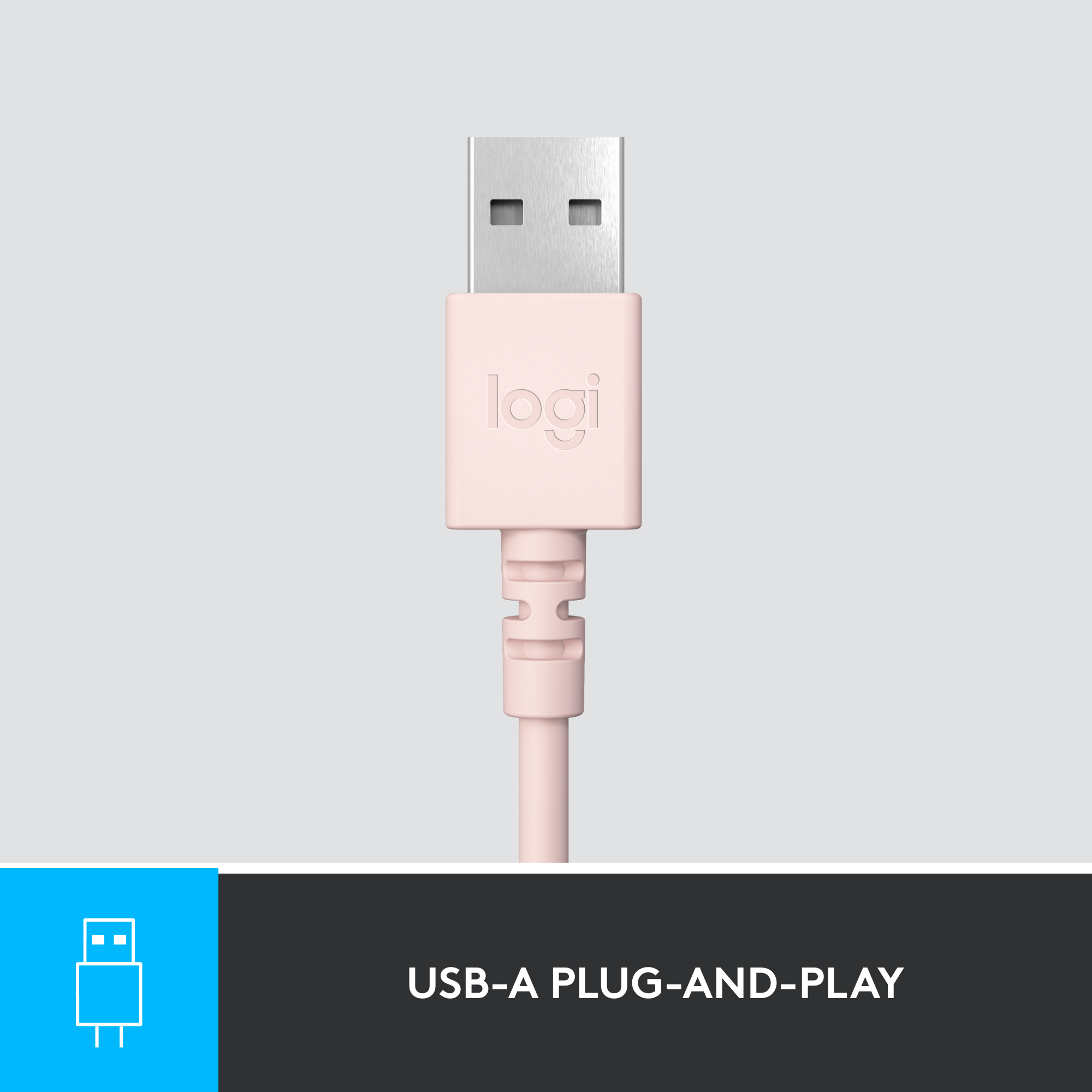 Un cavo USB-A rosa plug-and-play su sfondo grigio.