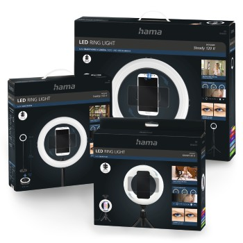 Drei schwarze Kartons mit LED-Ringlichtern und Smartphones darin.